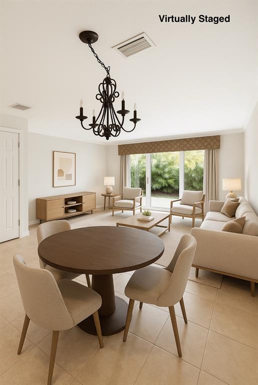 801 Southeast 16th Court, Unit 11 Fort Lauderdale, FL 33316 - Photo 10 of 49 a view of a dining room with furniture window and outside view