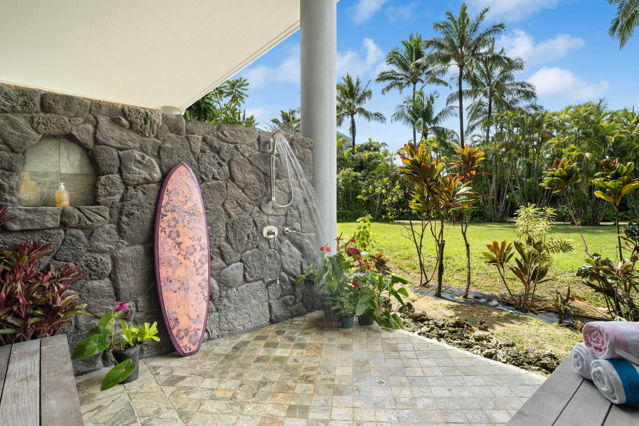 7312 Alealea Road Hanalei, HI 96714 - Photo 24 of 30 a view of a garden with a building in the background