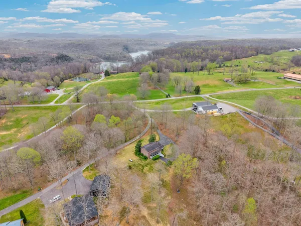 an aerial view of a houses with outdoor space