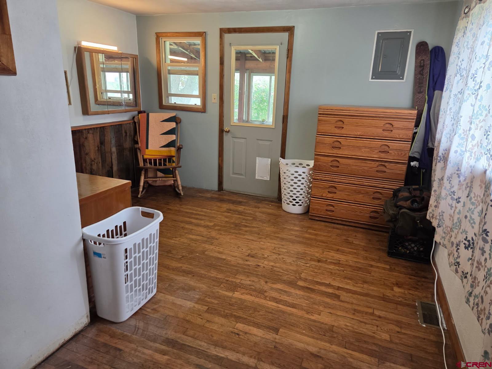 610 Ivy Street Nucla, CO 81424 - Photo 22 of 28 a room with furniture and a window
