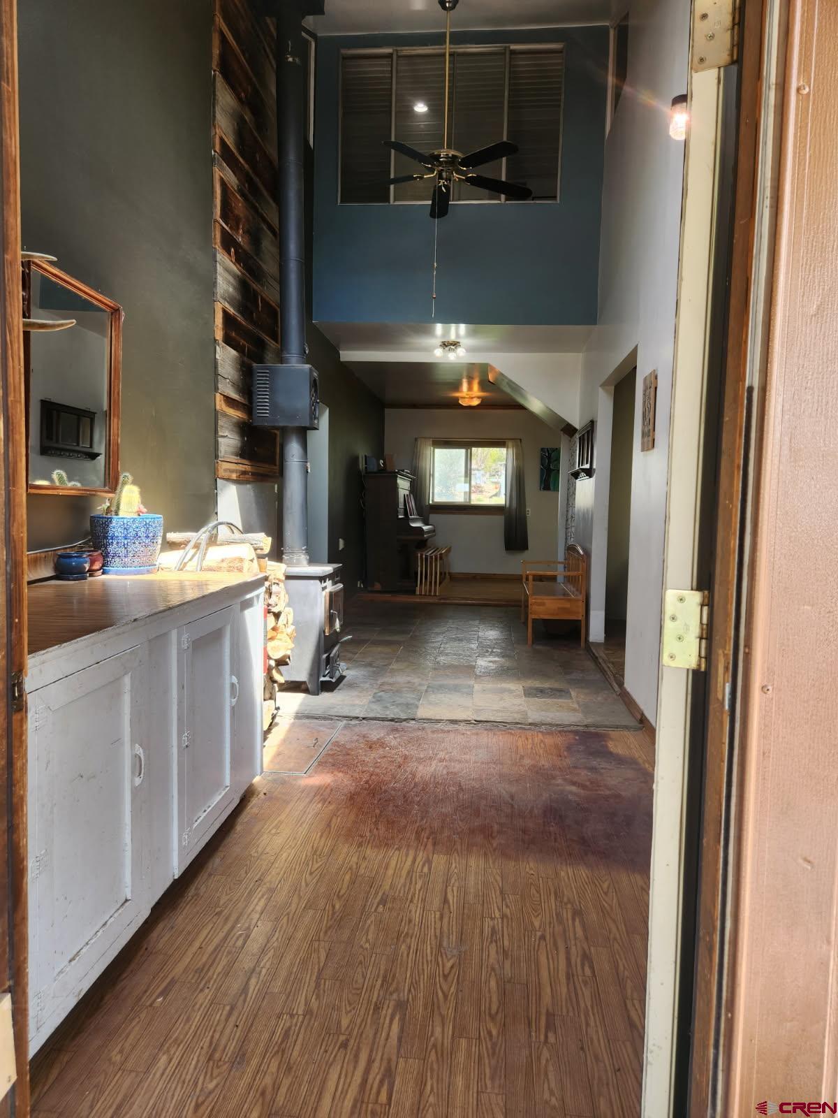 610 Ivy Street Nucla, CO 81424 - Photo 5 of 28 a view of a kitchen with a sink and cabinets