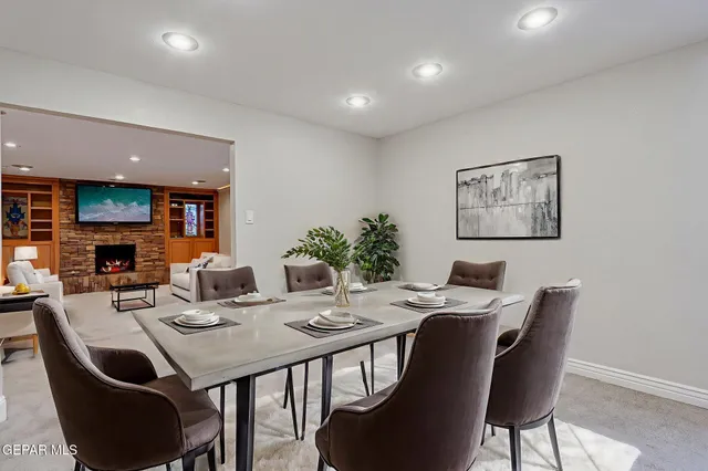 a kitchen with stainless steel appliances granite countertop a sink and cabinets