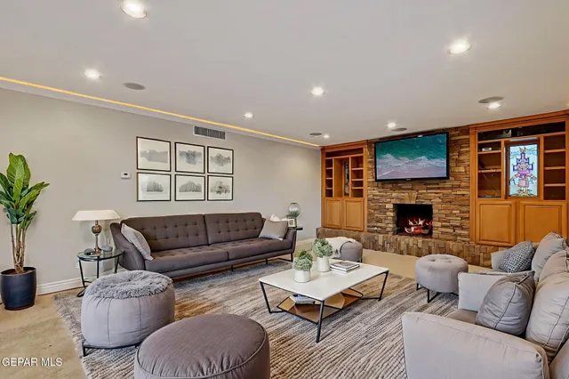a view of a livingroom with a fireplace