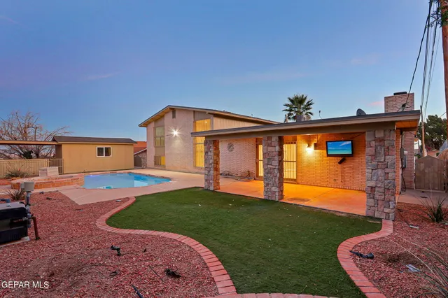 a view of a swimming pool with an ocean view