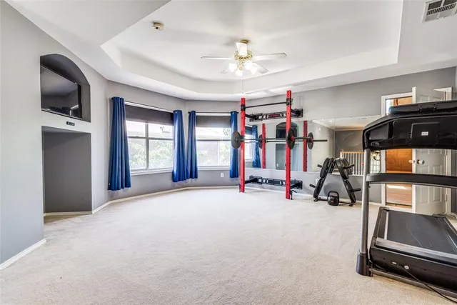 a view of a room with gym equipment