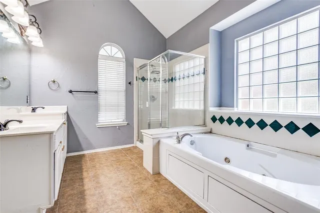 a bathroom with a bathtub and a sink