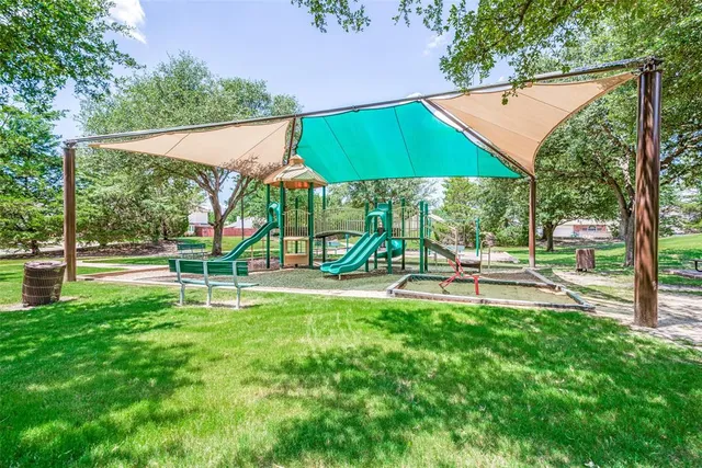 a view of a park with slide