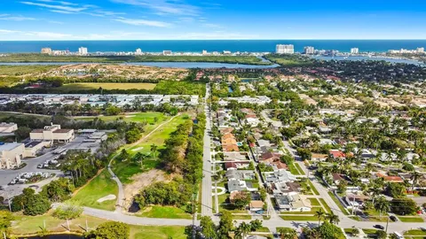 a view of a city with an ocean