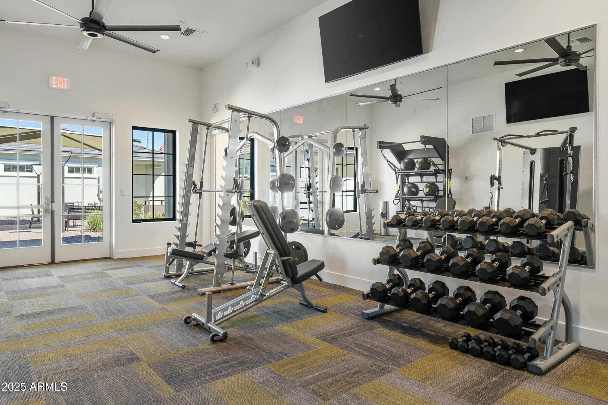 15601 West Cactus Road, Unit 1 El Mirage, AZ 85335 - Photo 17 of 17 a view of a room with gym equipment