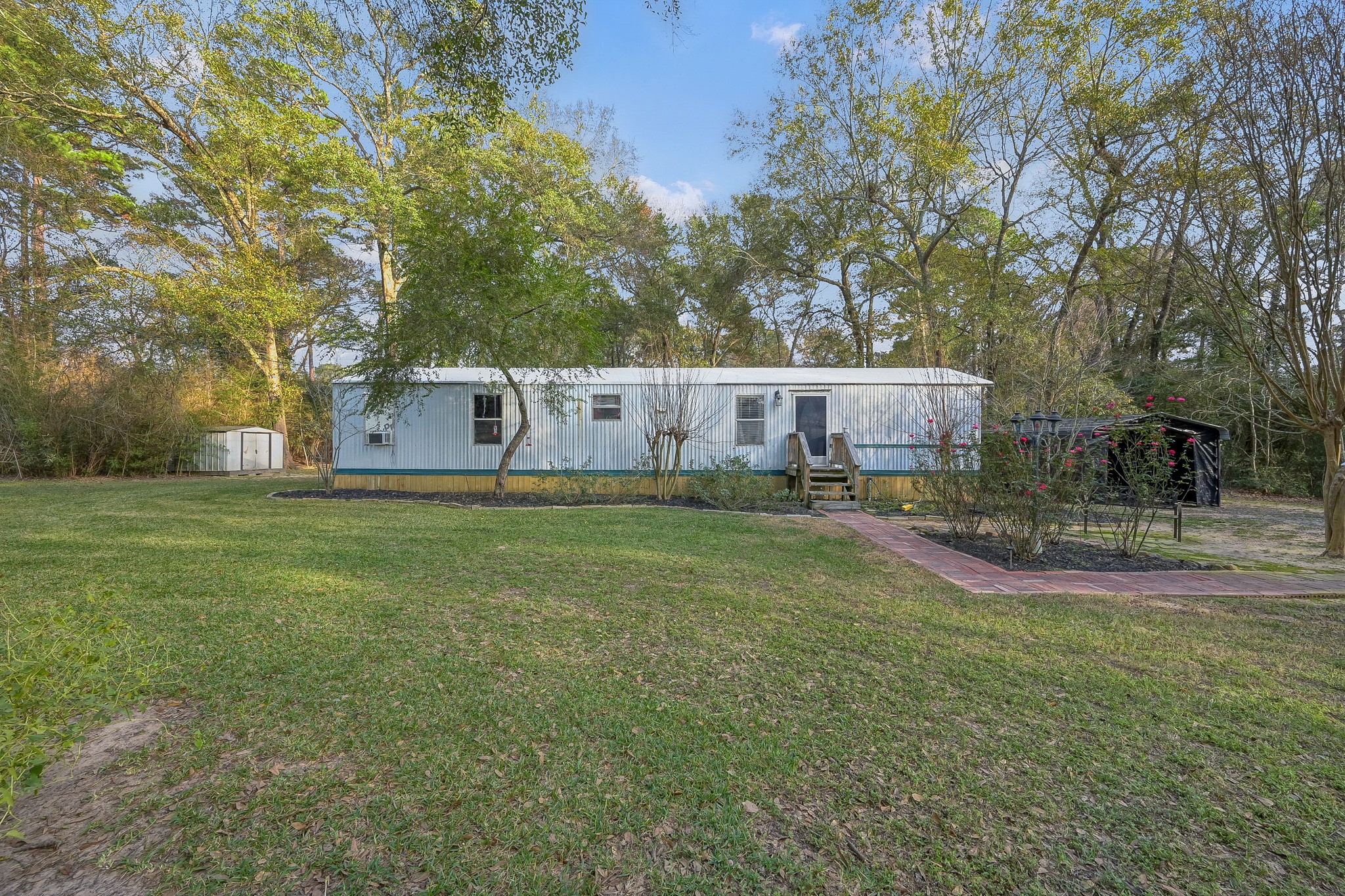 14363 Shepard Hill Road Willis, TX 77318 - Photo 3 of 28 a view of yard with green space