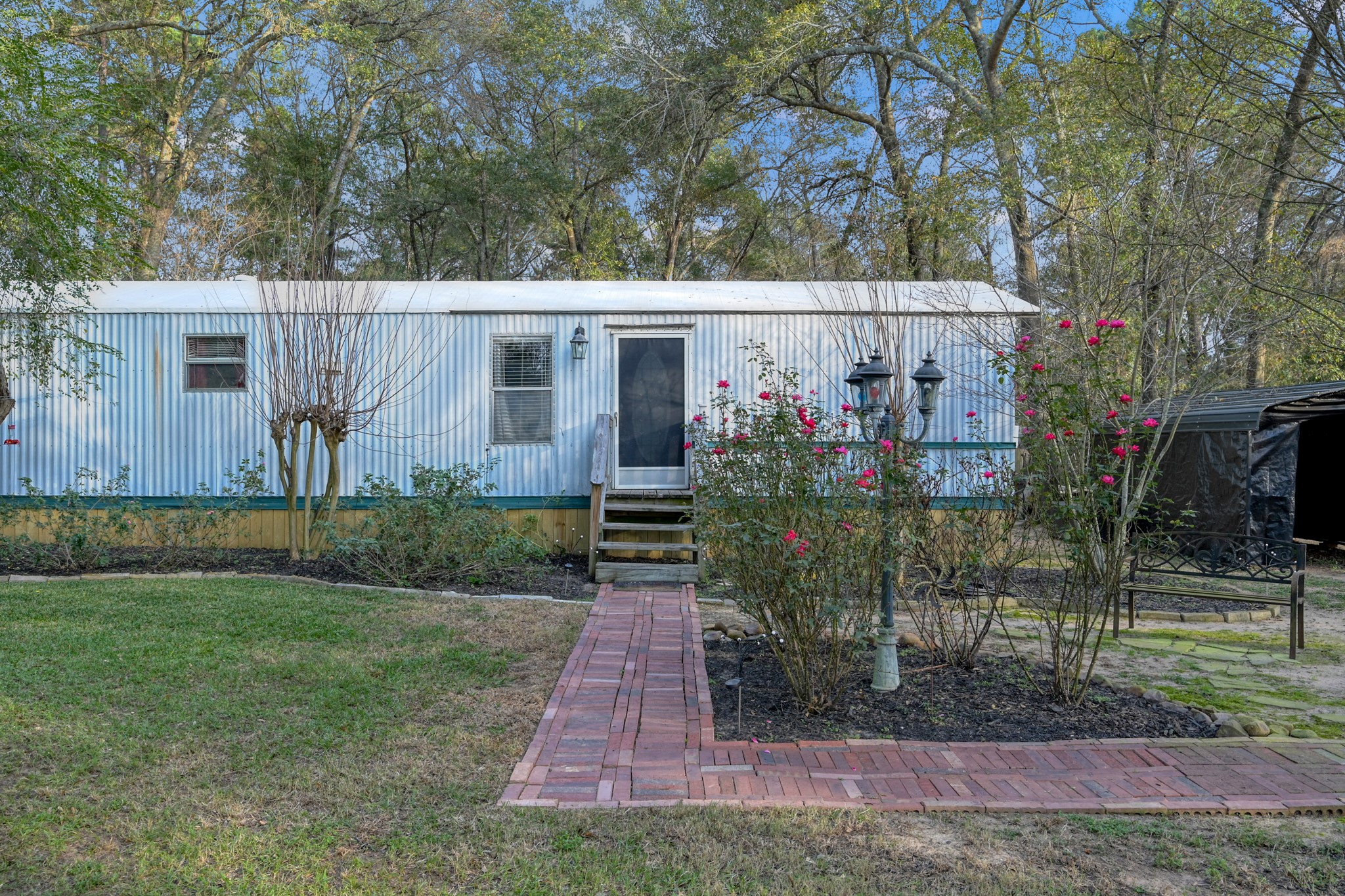 14363 Shepard Hill Road Willis, TX 77318 - Photo 4 of 28 a view of a back yard