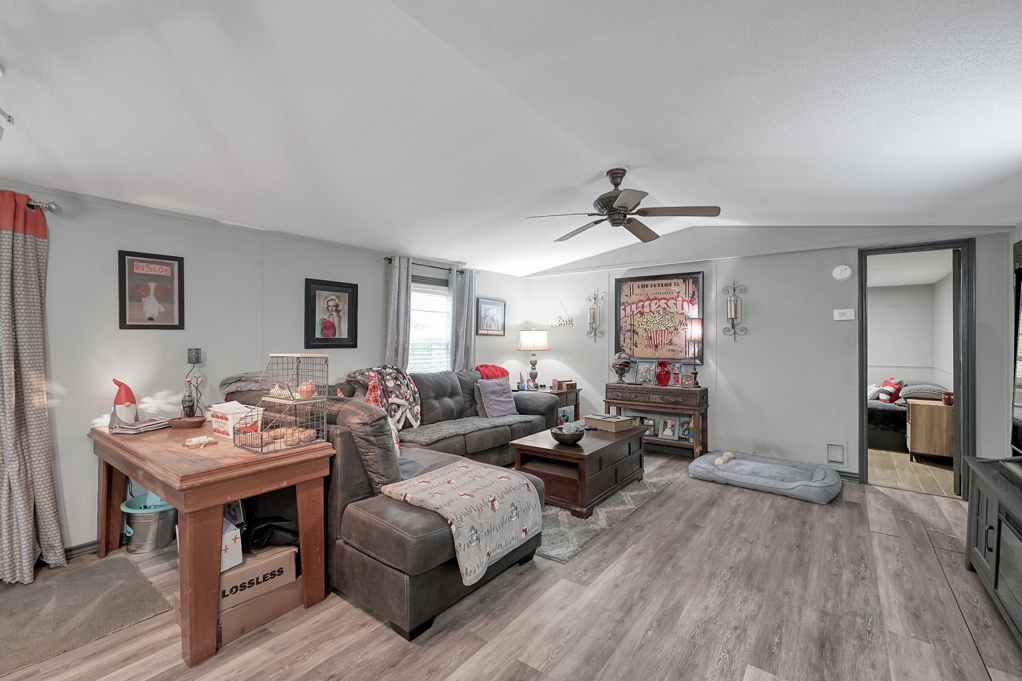 14363 Shepard Hill Road Willis, TX 77318 - Photo 7 of 28 a living room with furniture and a wooden floor