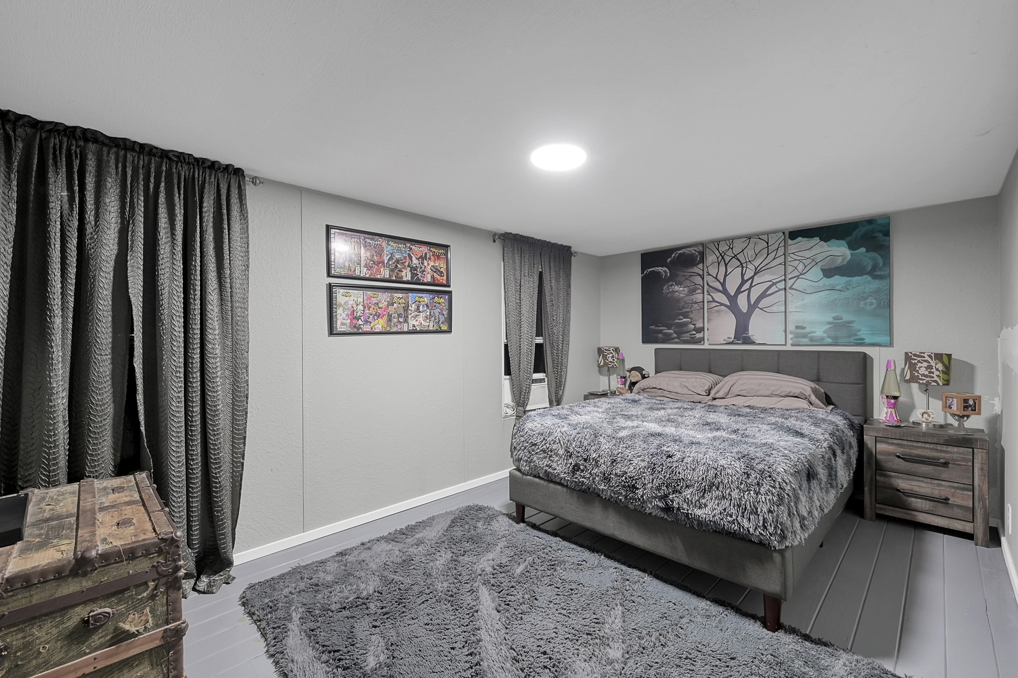 14363 Shepard Hill Road Willis, TX 77318 - Photo 10 of 28 a bedroom with a bed and a flat screen tv