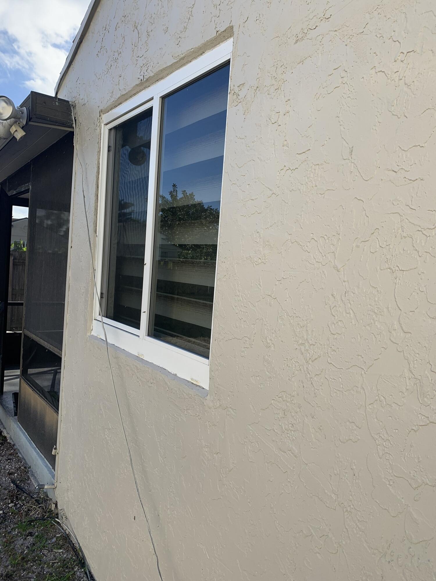 8438 Dynasty Drive Boca Raton, FL 33433 - Photo 32 of 34 Hurricane Impact Windows