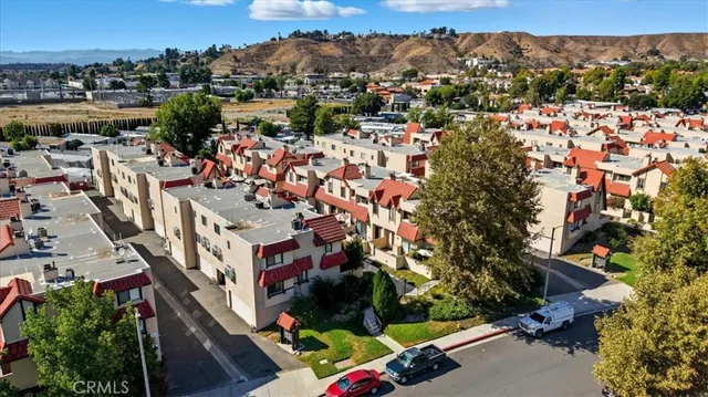 a view of a city with a lake