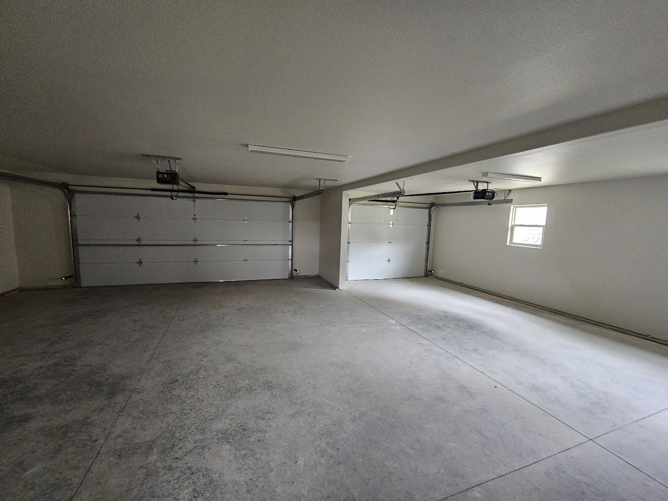 2223 Excalibur Way, Unit HB10) Sheridan, WY 82801 - Photo 6 of 21 3-Car Garage