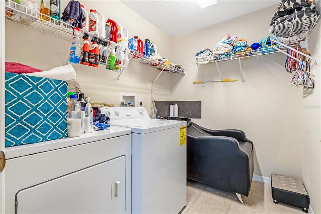2060 Doyle Road Deltona, FL 32738 - Photo 20 of 43 a utility room with dryer and washer