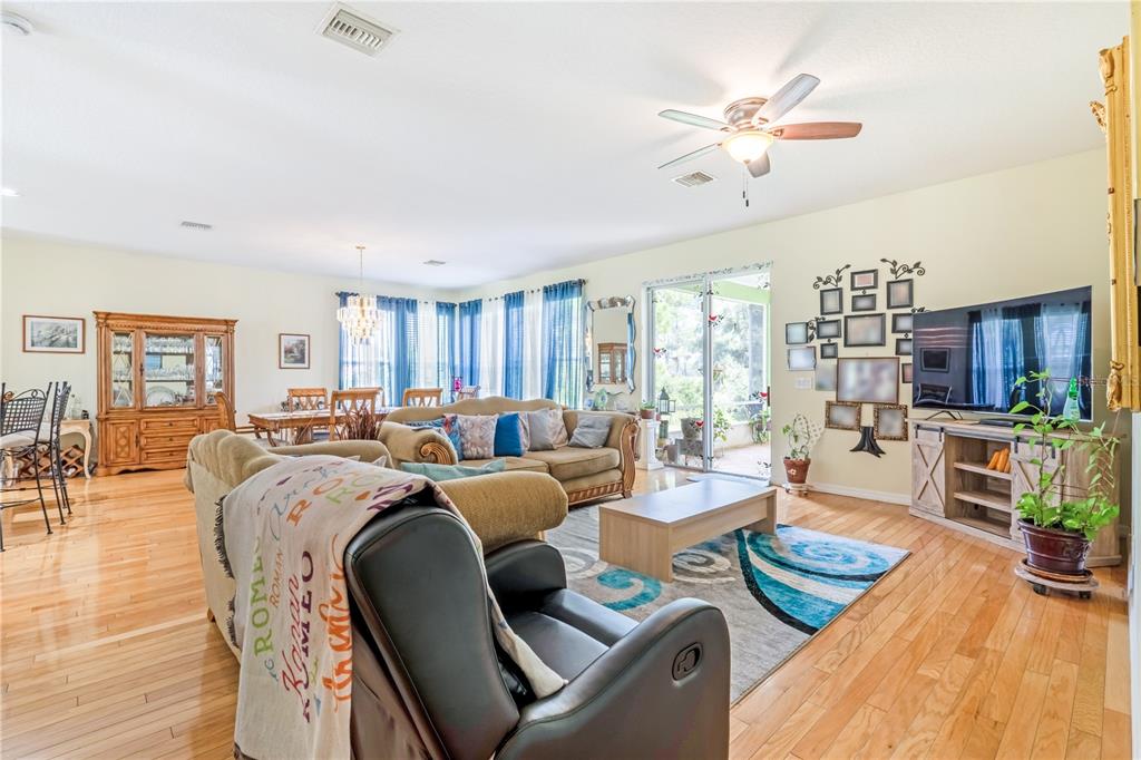 2060 Doyle Road Deltona, FL 32738 - Photo 31 of 43 a living room with furniture fireplace and a table
