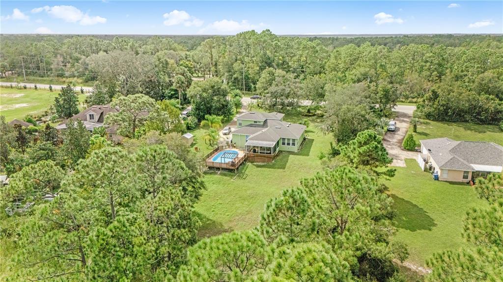 2060 Doyle Road Deltona, FL 32738 - Photo 42 of 43 a view of a lake with a city