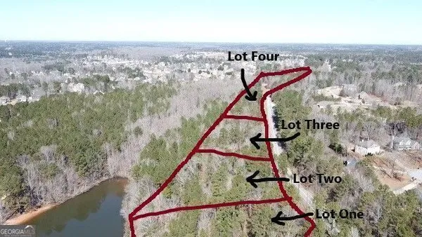 a view of a lake and a yard