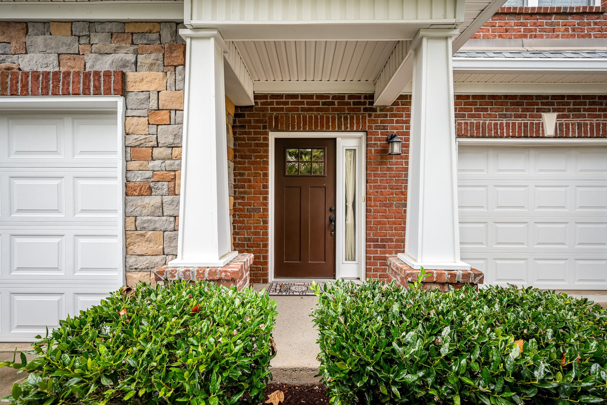 2342 North Tennessee Boulevard, Unit 1503 Murfreesboro, TN 37130 - Photo 1 of 36 a front view of a house with plants