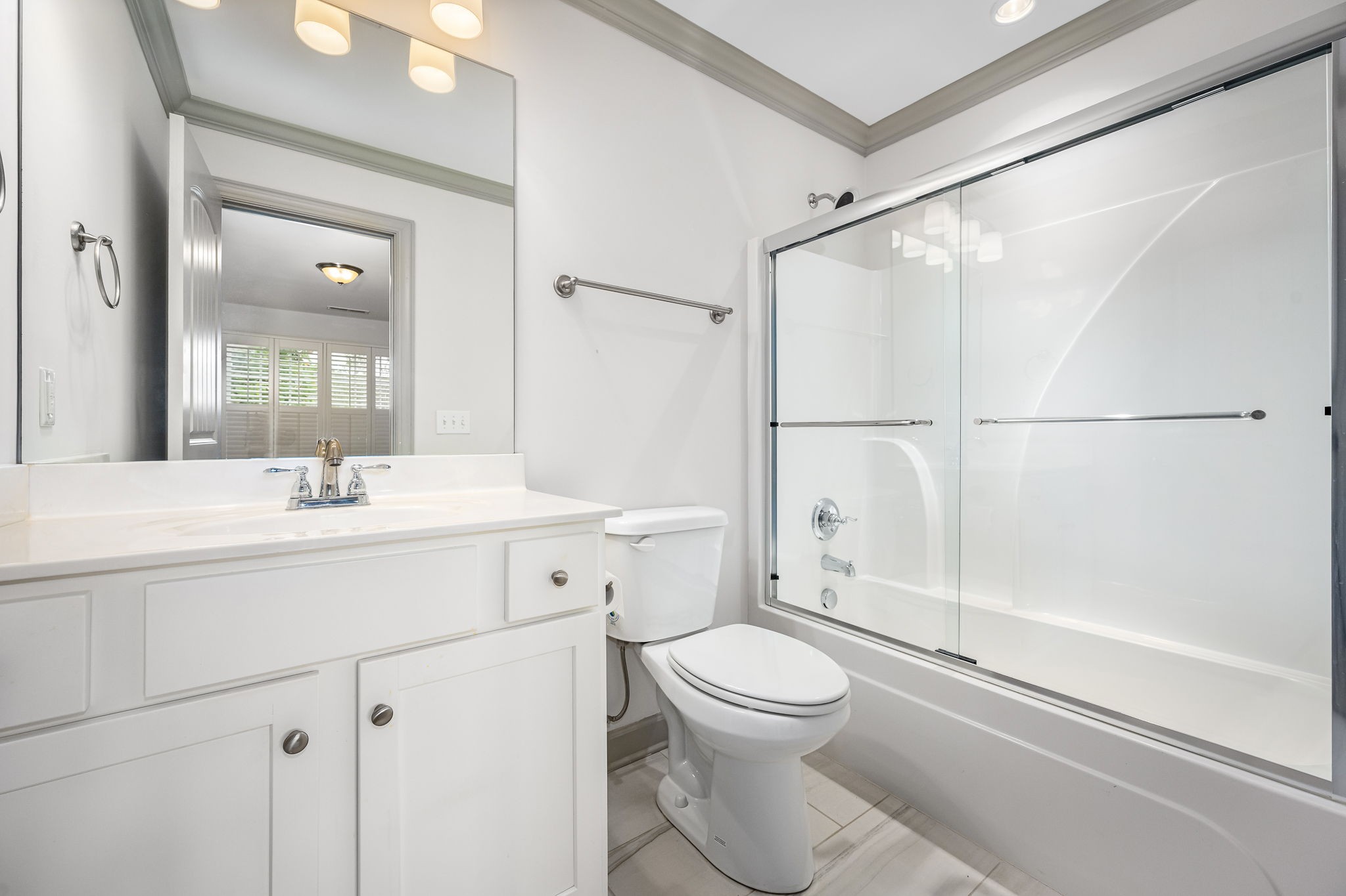 2342 North Tennessee Boulevard, Unit 1503 Murfreesboro, TN 37130 - Photo 30 of 36 a bathroom with a shower sink vanity mirror and toilet