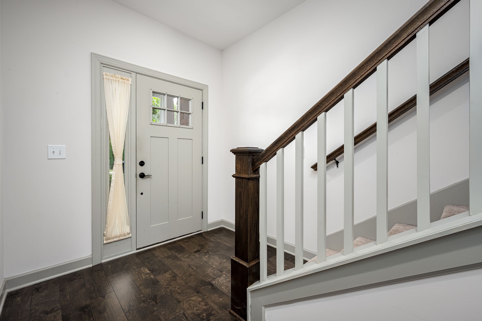 2342 North Tennessee Boulevard, Unit 1503 Murfreesboro, TN 37130 - Photo 8 of 36 a view of entryway with wooden floor and stairs