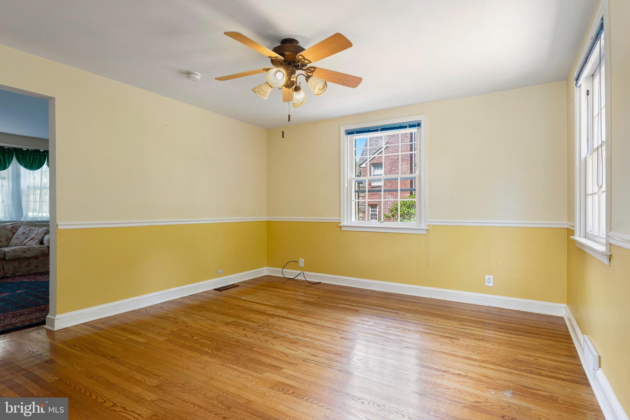 5020 Dermond Road Drexel Hill, PA 19026 - Photo 12 of 39 an empty room with wooden floor and windows