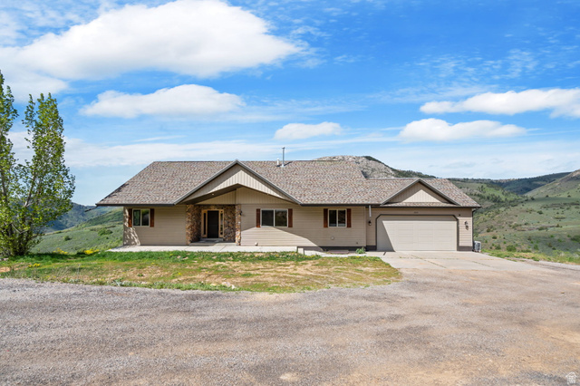 2013 North River View Road Huntsville, UT 84317 - Photo 2 of 53 Single story home with driveway, an attached garage, and a patio
