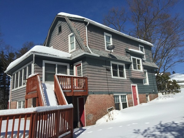 90 Eleanor Road Springfield, MA 01108 - Photo 5 of 30 a front view of a house with a balcony