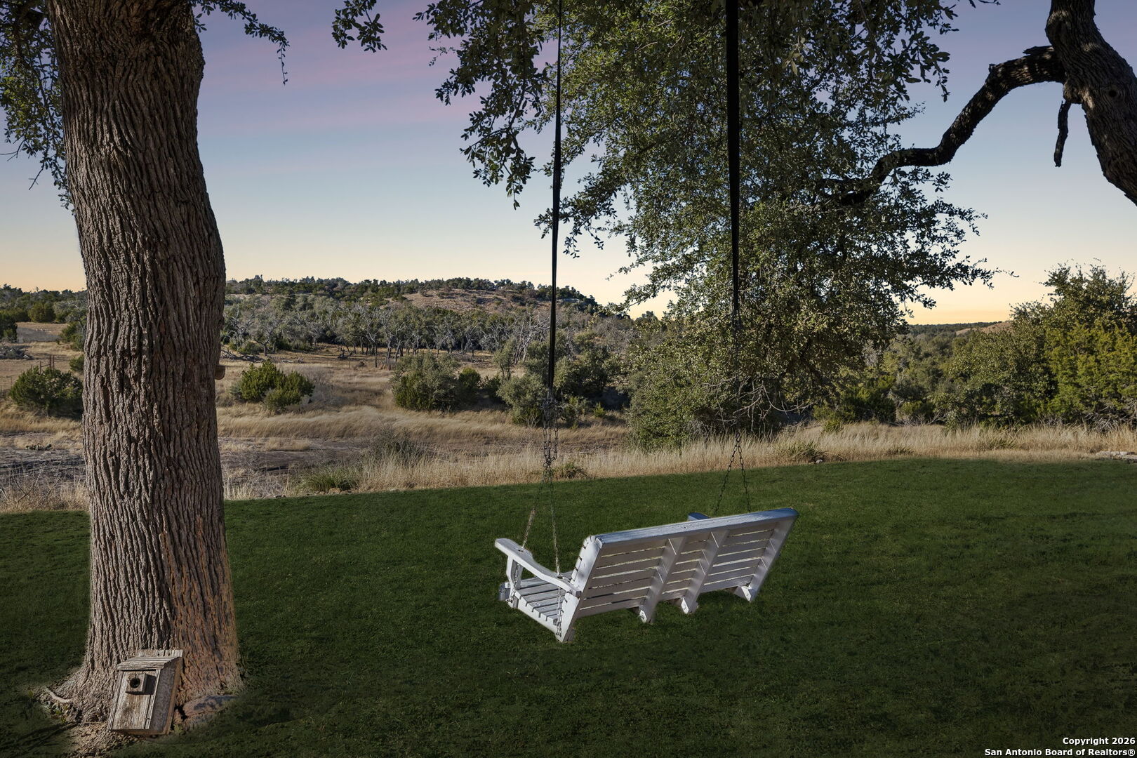 11890 Ranch Road 965 Fredericksburg, TX 78624 - Photo 2 of 40 a view of a lake with a yard
