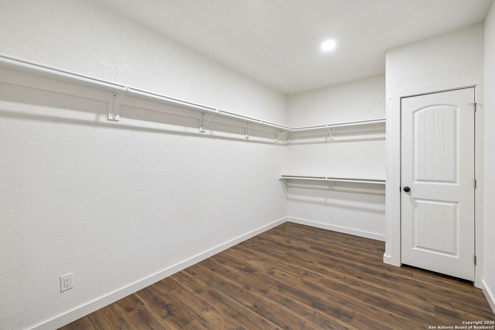 11890 Ranch Road 965 Fredericksburg, TX 78624 - Photo 22 of 40 a view of an empty walk in closet