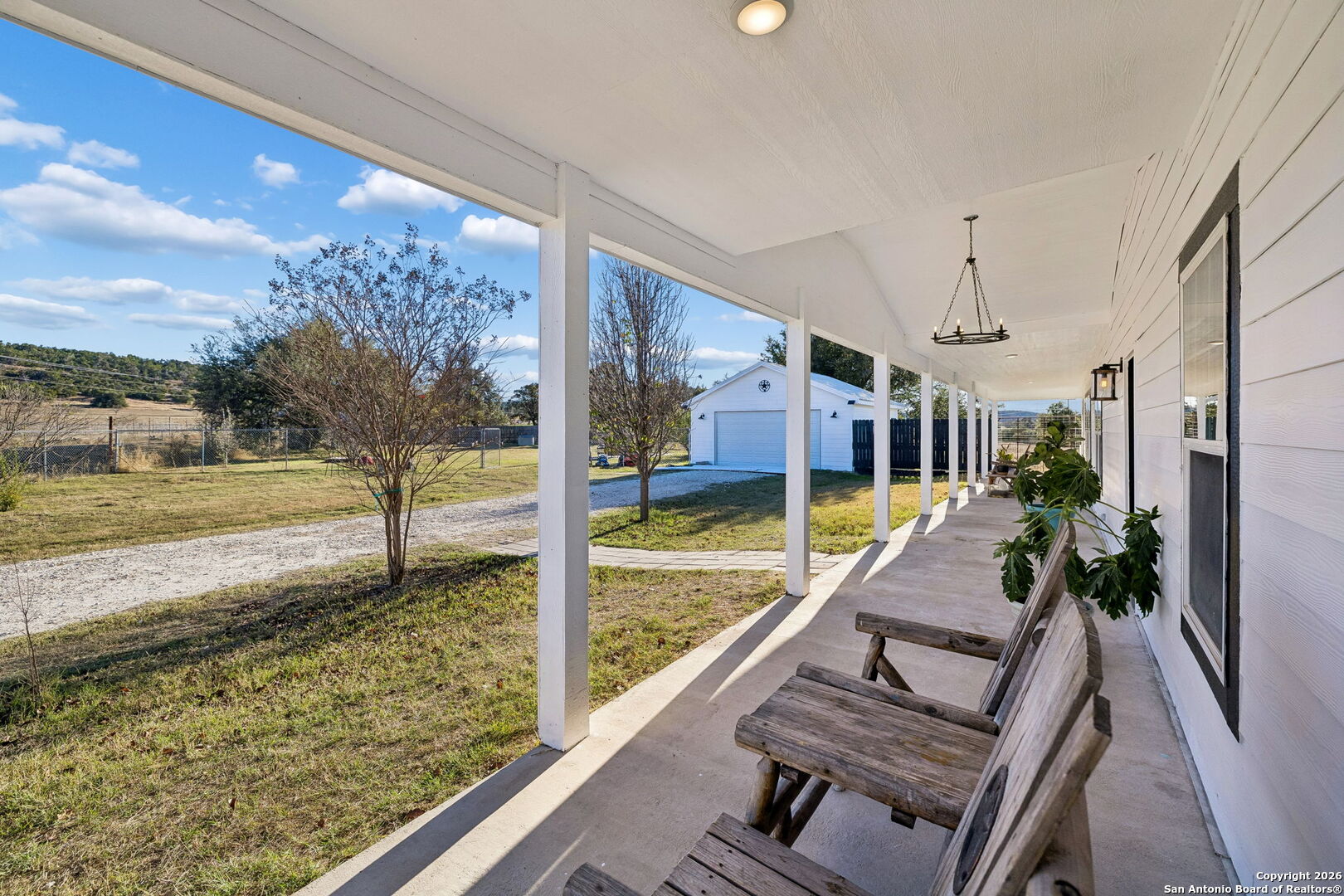11890 Ranch Road 965 Fredericksburg, TX 78624 - Photo 9 of 40 a view of swimming pool with a sitting space