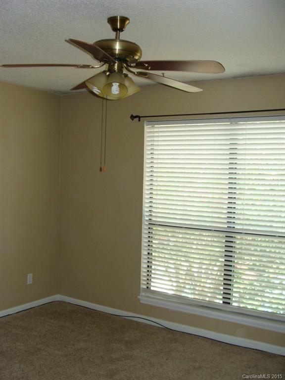 11030 Running Ridge Road, Unit 8435 Charlotte, NC 28226 - Photo 11 of 18 a view of a window in an empty room