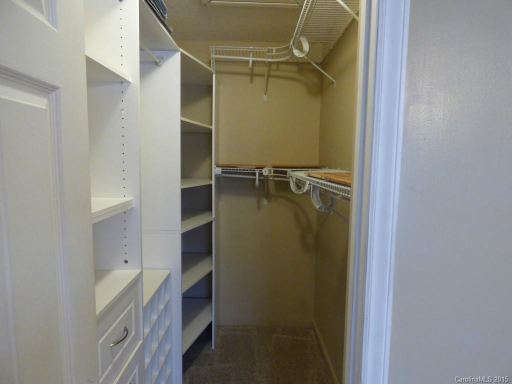 11030 Running Ridge Road, Unit 8435 Charlotte, NC 28226 - Photo 13 of 18 a bathroom with a tub