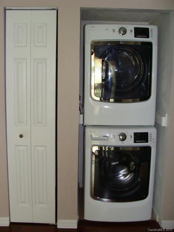 11030 Running Ridge Road, Unit 8435 Charlotte, NC 28226 - Photo 9 of 18 a close up view of a washer and dryer