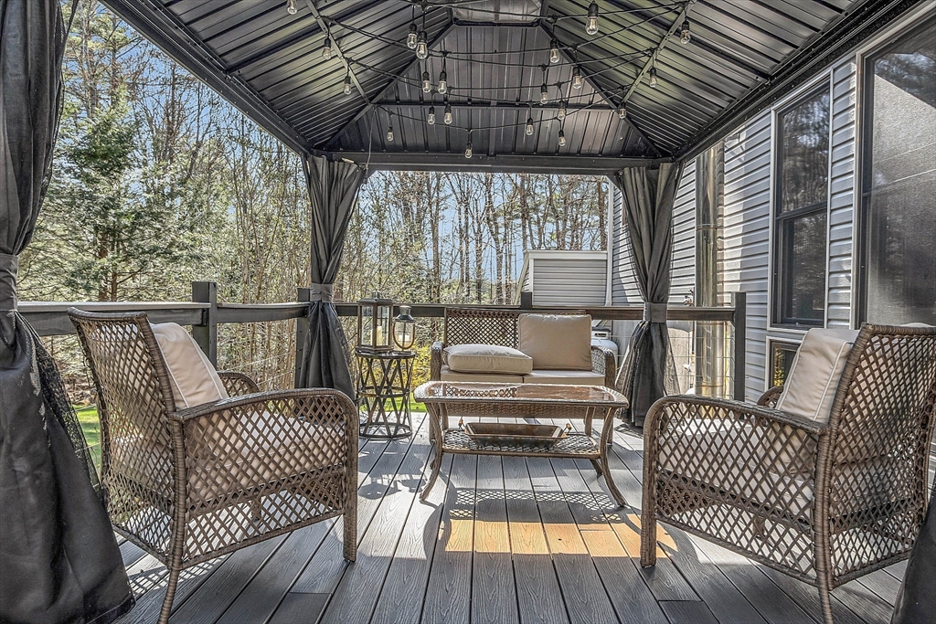337 Hubbardston Road Princeton, MA 01541 - Photo 4 of 42 a view of a balcony with wooden floor