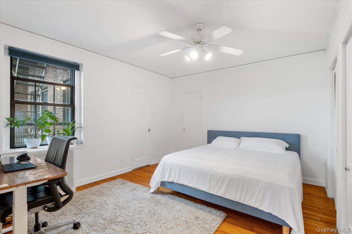 190 Garth Road, Unit 3R Scarsdale, NY 10583 - Photo 15 of 31 a bedroom with a bed and a desk