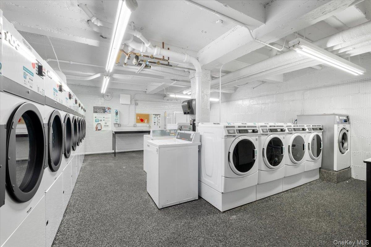 190 Garth Road, Unit 3R Scarsdale, NY 10583 - Photo 21 of 31 a utility room with dryer and washer