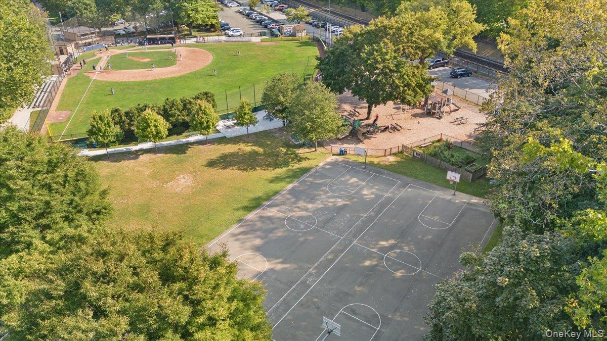 190 Garth Road, Unit 3R Scarsdale, NY 10583 - Photo 22 of 31 a view of a lake with a yard