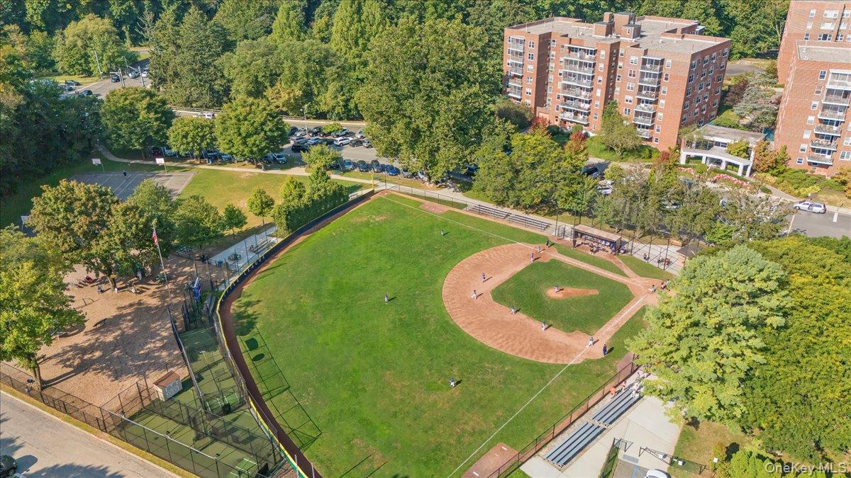 190 Garth Road, Unit 3R Scarsdale, NY 10583 - Photo 23 of 31 an aerial view of a swimming pool