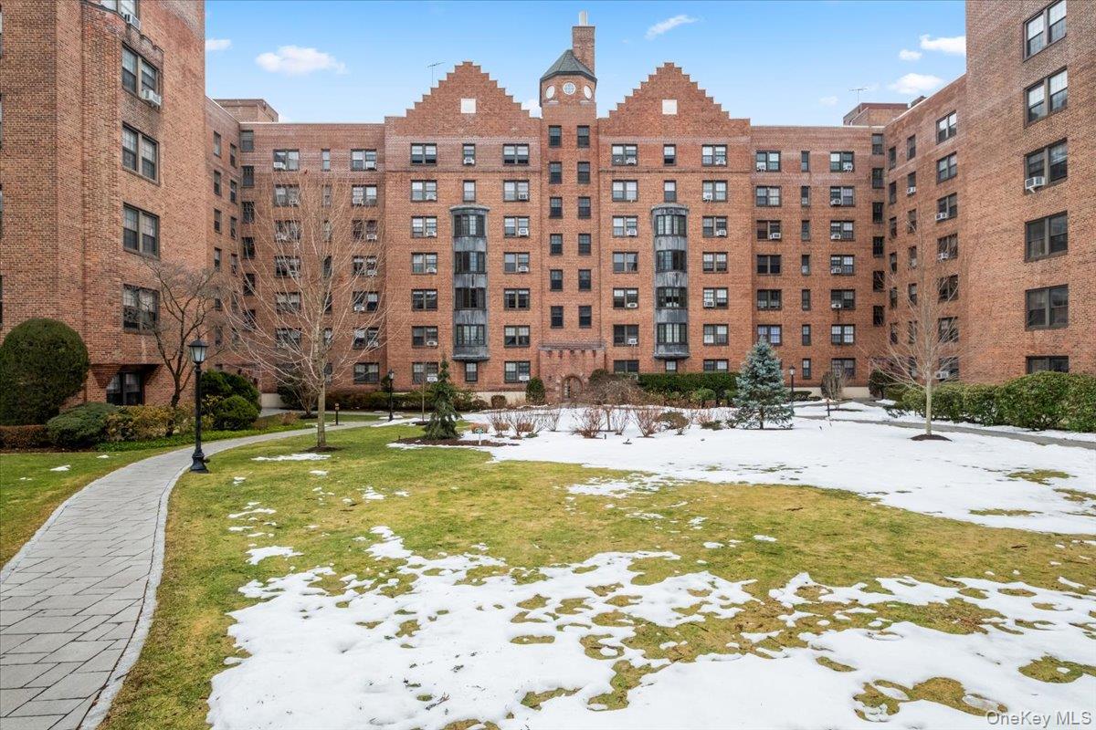190 Garth Road, Unit 3R Scarsdale, NY 10583 - Photo 28 of 31 a front view of a building with swimming pool