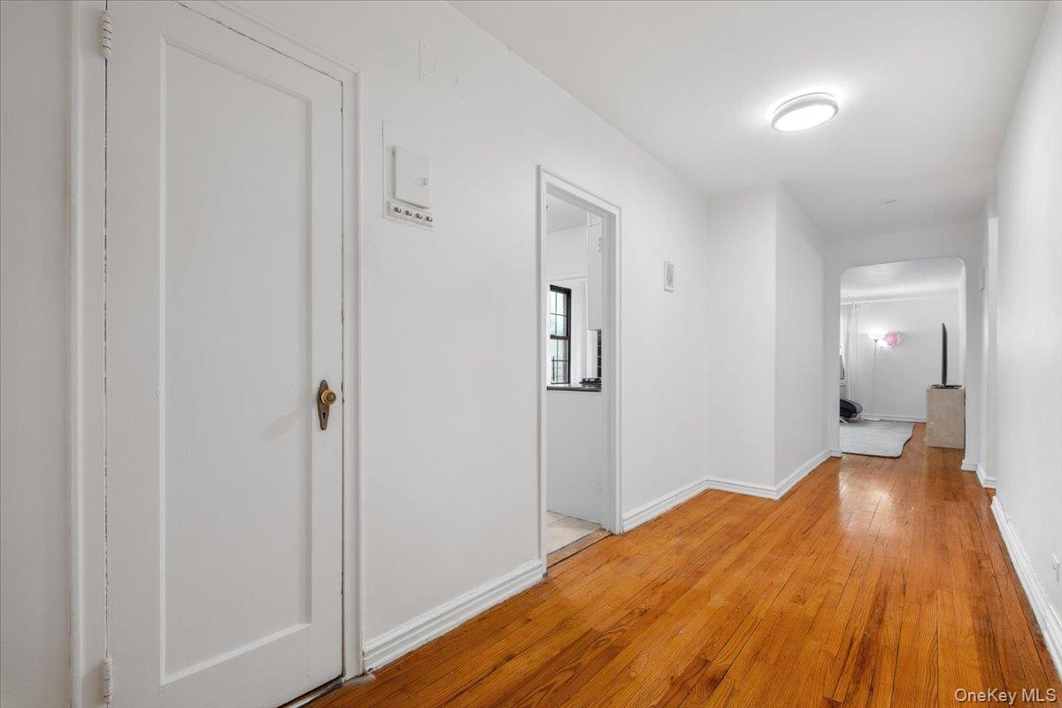 190 Garth Road, Unit 3R Scarsdale, NY 10583 - Photo 3 of 31 a bedroom with a bed and a table