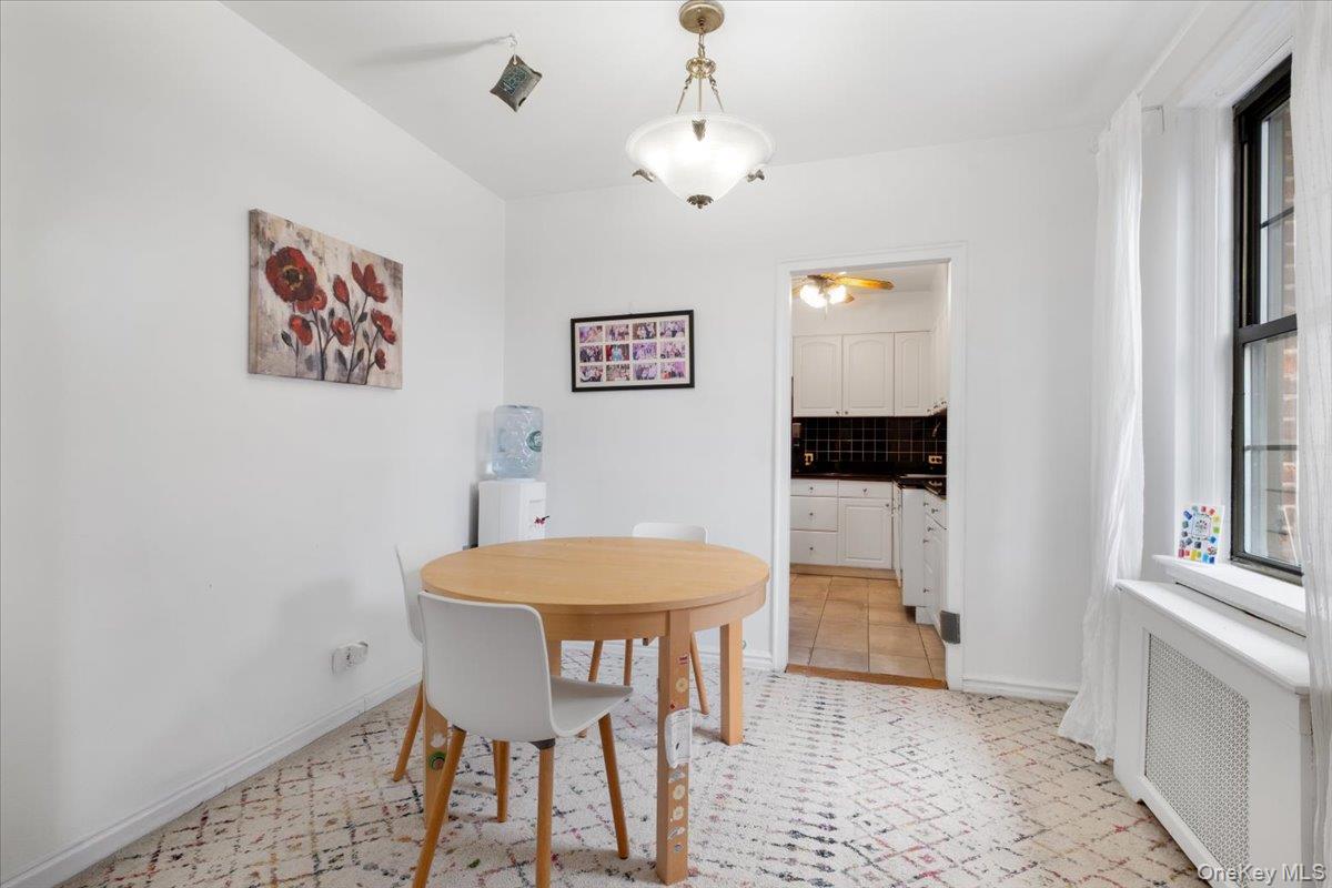 190 Garth Road, Unit 3R Scarsdale, NY 10583 - Photo 8 of 31 a view of a room with furniture and wooden floor