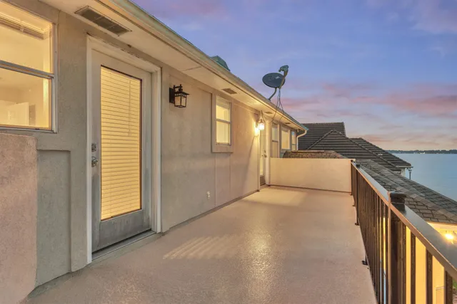 a view of a balcony with an entryway