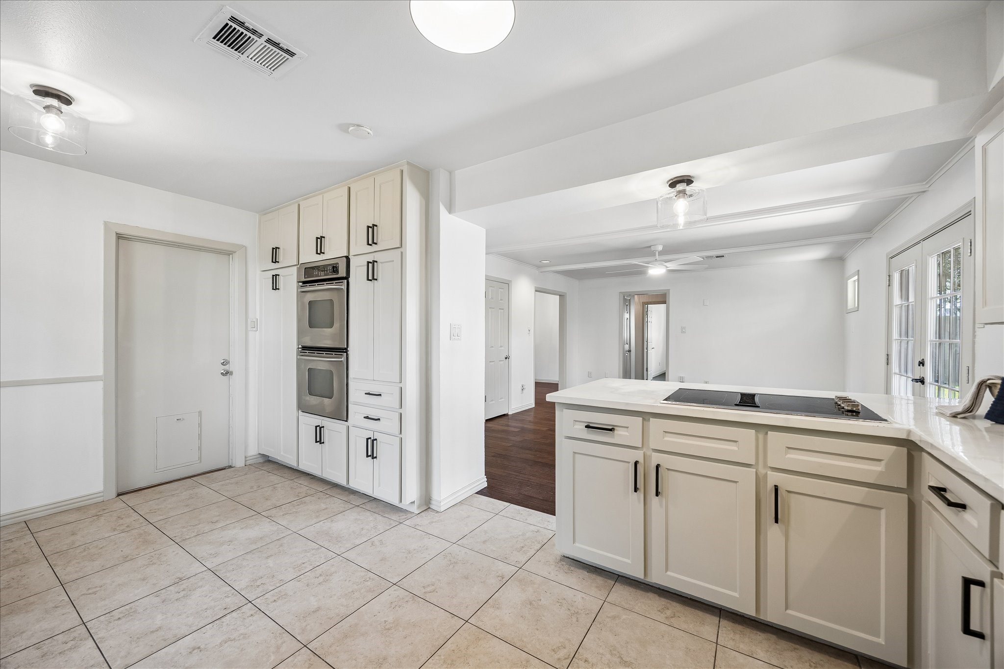 1327 Guese Road Houston, TX 77008 - Photo 8 of 18 The kitchen includes a breakfast area overlooking the side yard, a wall of built-in storage, and the added convenience of double ovens.