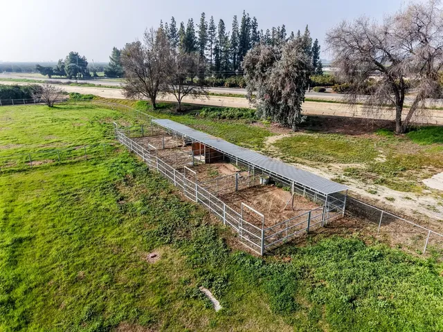 a kitchen with stainless steel appliances a white cabinets and a sink
