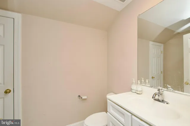 a bathroom with a sink toilet tub and shower