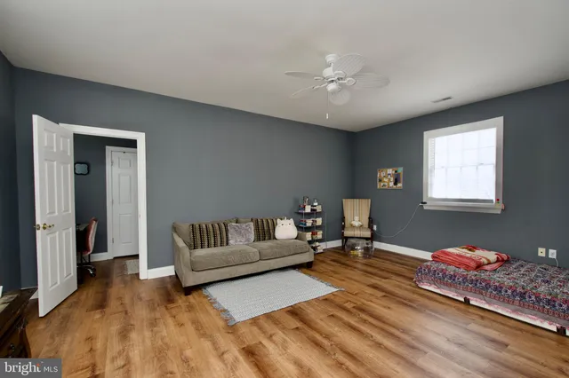 a bathroom with a shower and a toilet
