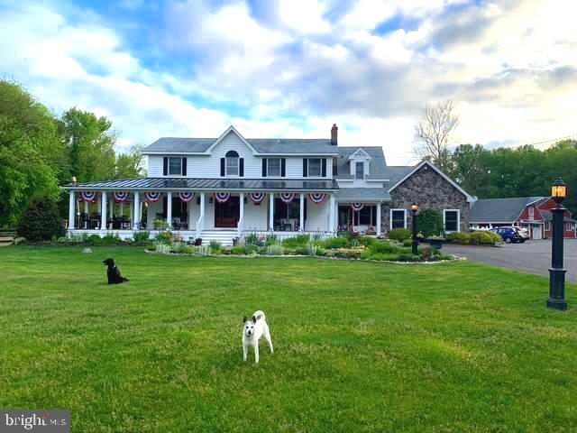 40 Cooper Tomlinson Road Medford, NJ 08055 - Photo 2 of 98 Animals playing on the front lawn